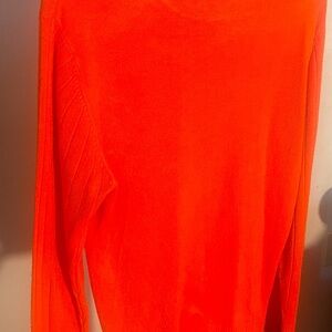 Orange with Blue Nautical.  This is a Like new sweater, XL 18-20.